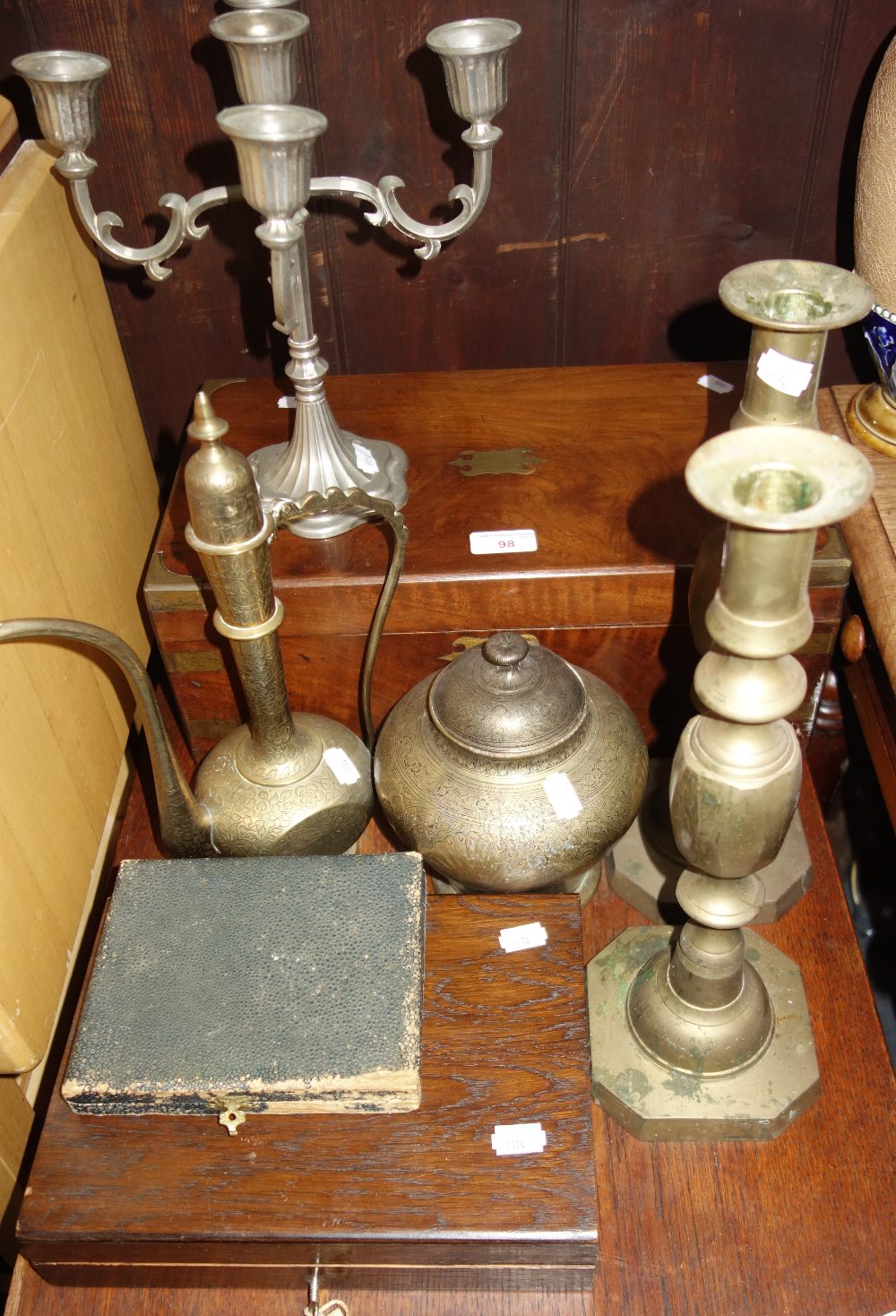 A 19TH CENTURY BRASS BOUND WALNUT WRITING SLOPE, a pair of brass candlesticks and sundries