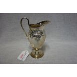 ASILVERREGENCYSTYLECREAMJUG,byTheGoldsmiths&SilversmithsCo,London,1899,balusterformwithscrollhandle,