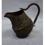 A BURMESE OR INDIAN CHASED COPPER JUG, with snake handle