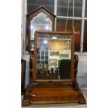 A VICTORIAN MAHOGANY DRESSING TABLE MIRROR and a Gothic style wall mirror