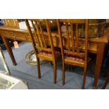 AN EDWARDIAN MAHOGANY PARTNER'S DESK, 184cm wide, a tartan upholstered bed head with hinged wings,