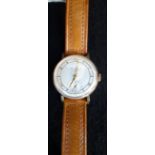 J W BENSON, LONDON: A gentleman's wristwatch attached to a brown leather strap in a fitted