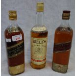 A BOTTLE OF JOHNNIE WALKER BLACK LABEL WHISKY, 4/5 QUART, another similar Red Label and a bottle