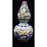 BLUE AND WHITE "DRAGON" JAR in the Ming style, apocryphal Xuande mark, 18cm high