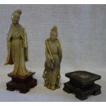 A PAIR OF ORIENTAL SOAPSTONE STUDIES OF FEMALE FLUTE PLAYERS, 15.5cm high