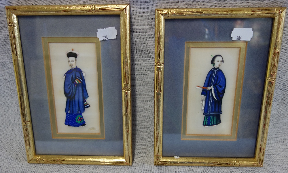 A CHINESE PITH PAINTING OF A MAN IN TRADITIONAL BLUE COSTUME and a companion painting of a woman,