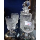 A WATERFORD BRANDY GLASS, a pair of decanters and other glassware