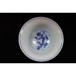 MING STYLE BLUE AND WHITE "DRAGON" BOWL, with apocryphal four character mark, 15cm dia.