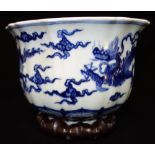 MING STYLE BLUE AND WHITE "DRAGON" VASE of lotus flower head form, apocryphal Xuande mark 12.5cm