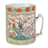 A CHINESE FAMILLE ROSE EXPORT TANKARD, Quing Dynasty, 19th century painted with exotic birds and