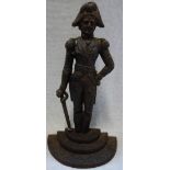 A CAST IRON DOOR STOP in the form of The Duke of Wellington, 36.5cm high
