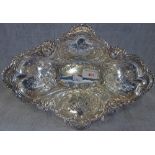 A PIERCED AND EMBOSSED SILVER DISH OF LOZENGE FORM, 31.5cm wide, approx 10.15oz