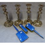 A SET OF FOUR 19TH CENTURY SILVER PLATED CANDLESTICKS and an enamel backed brush set