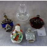 A COLLECTION OF PERFUME BOTTLES to include a Chinese mother of pearl example with carved decoration