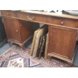 AN EARLY 20TH CENTURY WALNUT DESK, by Brauer & Wirth, Stuttgart, 120cm wide