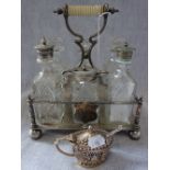 A CUT GLASS AND WHITE METAL CRUET ON STAND, with carrying handle