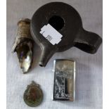 AN ANCIENT POTTERY OIL LAMP and similar items