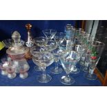 A VINTAGE 'FESTIVAL OF BRITAIN' GLASS DECANTER with glasses, Babycham glasses and similar glassware