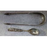 A PAIR OF SILVER TONGS and a Danish spoon, approx 2.50oz