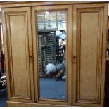 A VICTORIAN PALE BURR ASH TRIPLE WARDROBE, by George Trollope & Sons, Halkin Street West, Belgrave