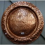 A LARGE CIRCULAR COPPER CHARGER, 58cm dia.