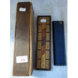 A COLLECTION OF 19TH CENTURY BONE AND EBONY DOMINOES, a Victorian Tartan Ware cribbage board and