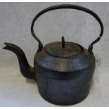 A 19TH CENTURY CAST IRON KETTLE