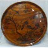 A LARGE MAHOGANY PAINTED TRAY decorated with birds on foliage, 85cm dia. and a smaller metal tray (