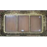 A 19TH CENTURY MOULDED AND GILT FRAME, fitted with gilt slip to take three pictures