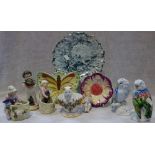 A PAIR OF EDWARDIAN FIGURES OF CHILDREN with fish and a collection of decorative ceramics
