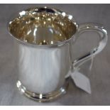 A SILVER TANKARD, 12cm high, approx 12.75oz