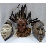 THREE TRIBAL MASKS, PUNU, YAURE AND IBIBIO