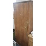 A VICTORIAN STRIPPED PINE KITCHEN CUPBOARD, with ledged match boarded door, the interior fitted with