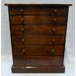 A LATE 19TH CENTURY STAINED PINE COLLECTOR'S CABINET, fitted six graduated drawers, 45.5cm high