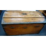 A LARGE 19TH CENTURY HARDWOOD DOMED TOP CABIN TRUNK, metal bound with large brass carrying handles