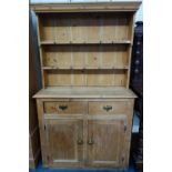 A SMALL VICTORIAN STRIPPED PINE KITCHEN DRESSER, 100cm wide