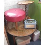 A 1950'S CIRCULAR COFFEE TABLE, with brass tipped legs and brass rim, a similar stool, a barley