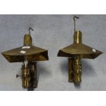 A PAIR OF BRASS WALL HUNG OIL LAMPS (converted to electricity)