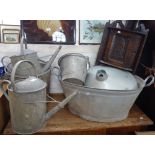 TWO VINTAGE GALVANIZED WATERING CANS, three buckets, a galvanized tub and two similar shades