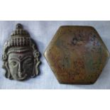 A CHINESE INSCRIBED HEXAGONAL COPPER LIDDED INK BOX and a Tibetan bronze Bodhisattva plaque (2)
