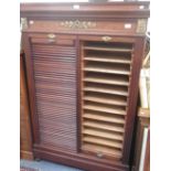 A MAHOGANY TAMBOUR FRONT DOUBLE FILING CABINET, with gilt mounts, 105cm wide (key in office)