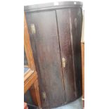 A 19TH CENTURY HANGING BOW FRONT CORNER CUPBOARD, with crackle finish, 72cm wide