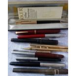 A VINTAGE PARKER INK PEN and a collection of similar pens
