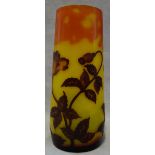 AFTER GALLE; A YELLOW AND ORANGE GLASS VASE overlaid with stylised flowering plants, 22.5cm high