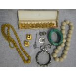 A COLLECTION OF VINTAGE COSTUME JEWELLERY, to include a silver pair of buckles, a wide metal bar