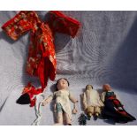 A VICTORIAN COMPOSITE DOLL, with painted face and fabric body, 30cm high, a Japanese boy doll and