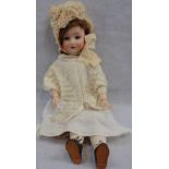 A H GERMANY; A BISQUE HEADED DOLL, with glass eyes and fully jointed composite body, "A 10" H