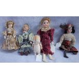 A BISQUE 'KEWPIE' DOLL (re-glued head) and a collection of Victorian/ Edwardian bisque doll's