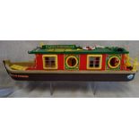 A COLLECTION OF SYLVANIAN FAMILIES, including a narrow boat and similar items