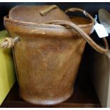 A BROWN LEATHER BUCKET BAG by Norris, Circa 1980's